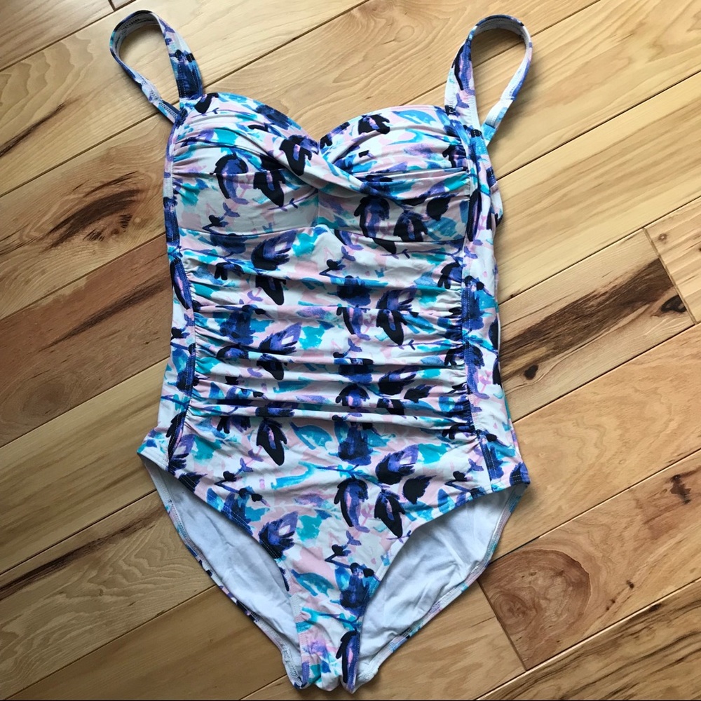 EUC. Floral pattern Nip Tuck one piece swimsuit.